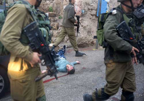 إستشهاد فلسطيني بإطلاق نار إسرائيلي غرب رام الله واعتقال 20 فلسطينيا من الضفة