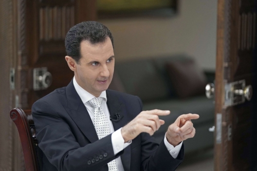 الأسد يدافع عن الوجود الروسي في بلاده