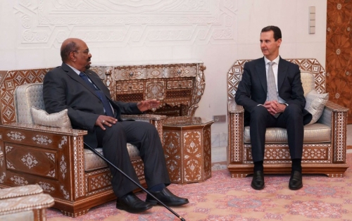 البشير يلتقي الأسد في زيارة مفاجئة إلى دمشق