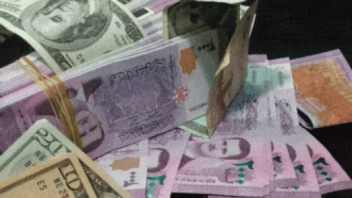 السلطات السورية تجبر المواطنين على صرف 100 دولار للعملة المحلية بمجرد دخول البلاد
